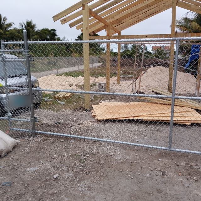 Fence and gate on a building site